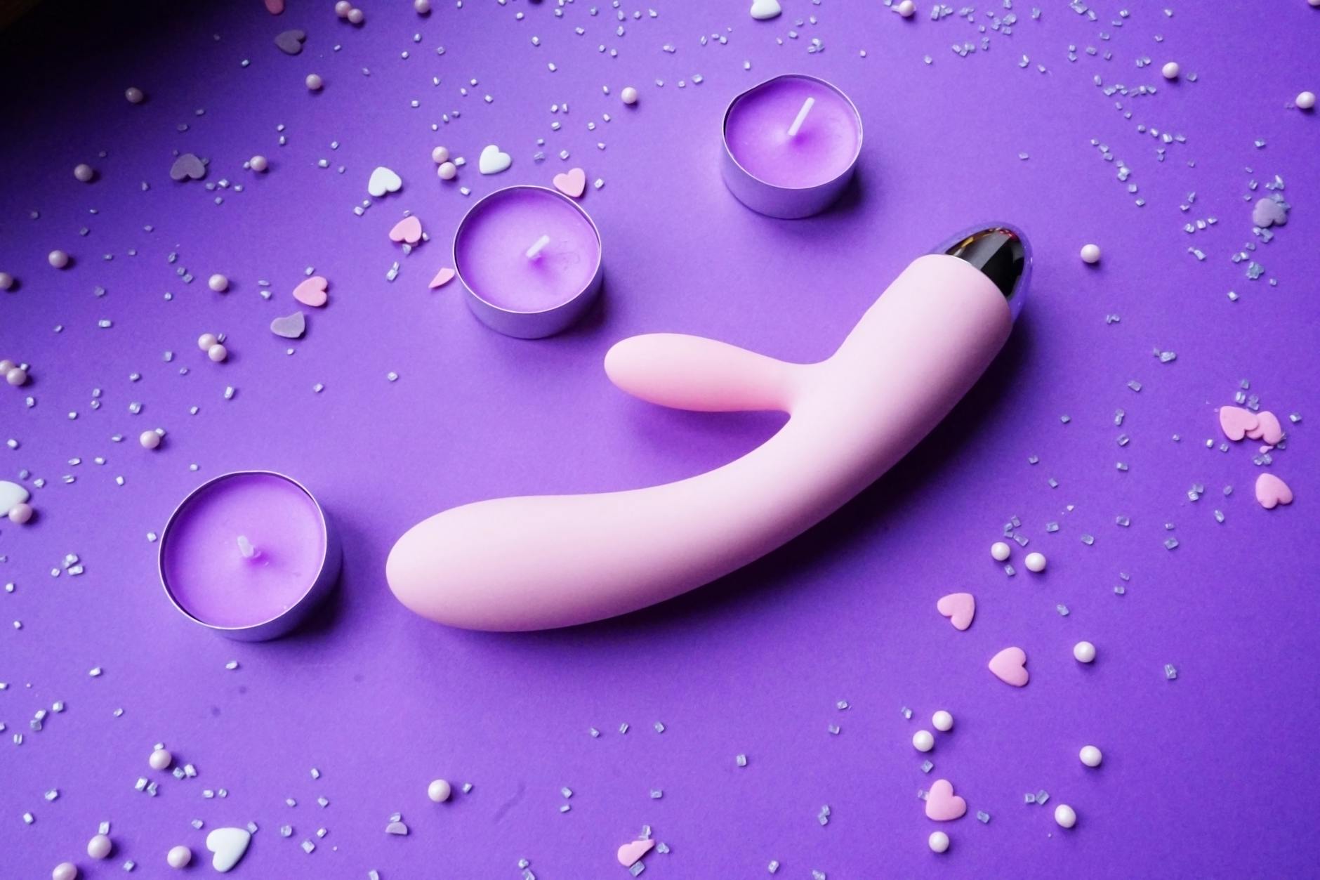 Fresh lemon held in cupped hands, symbolizing the gentle, natural approach of lemon vibrators